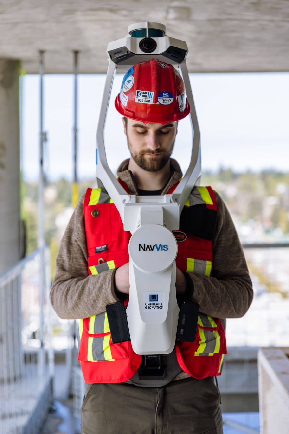 Person wearing geomatics equipment.