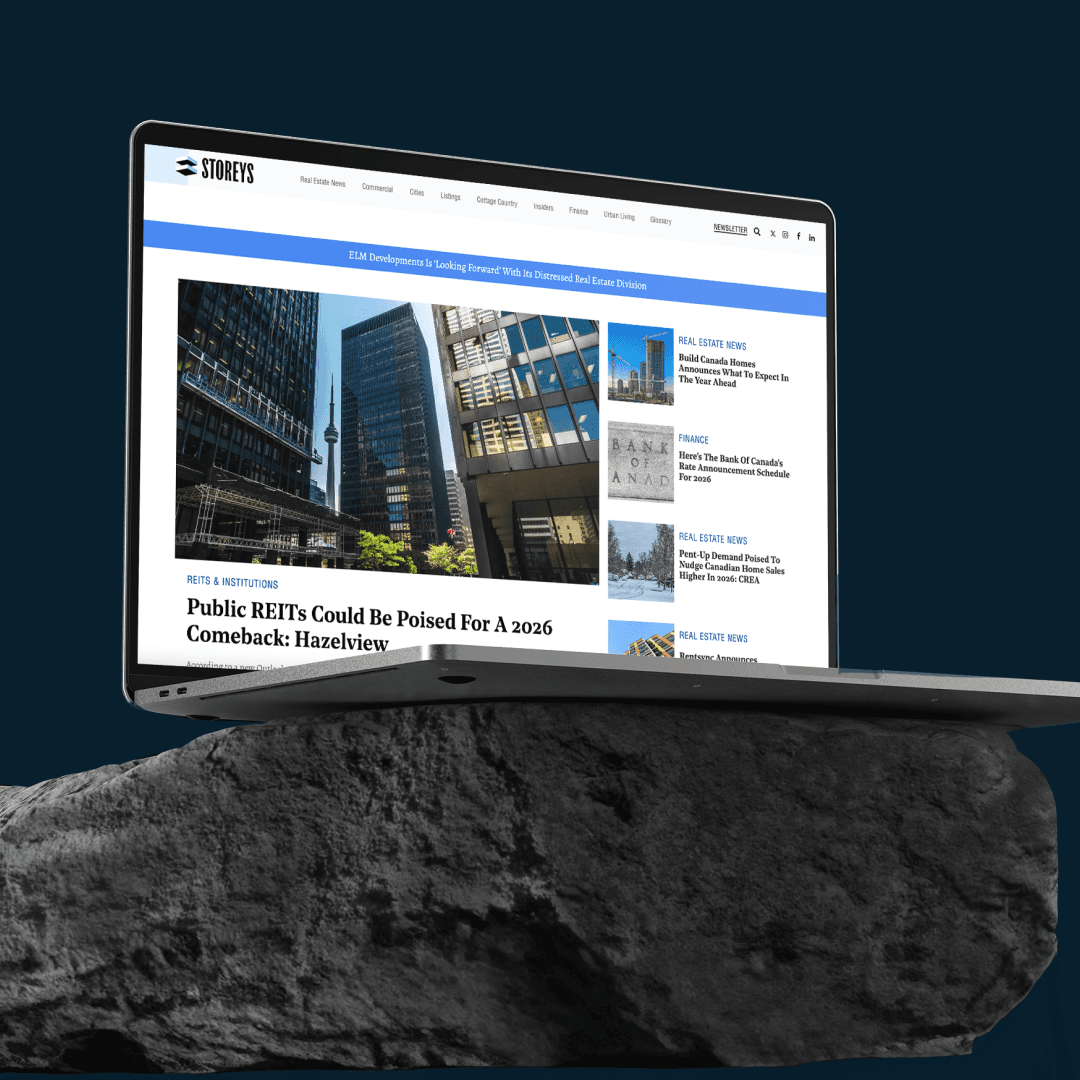 Laptop pictured showing STOREYS.com website.