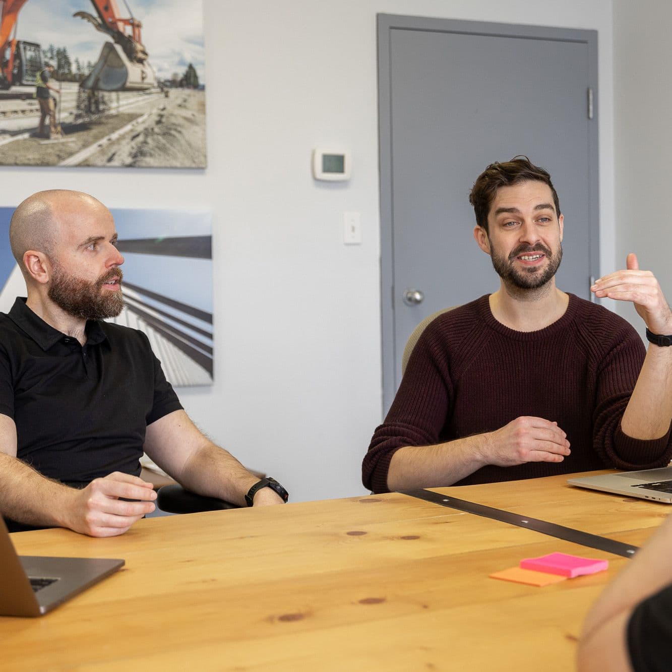 2 men conduct a brand strategy session