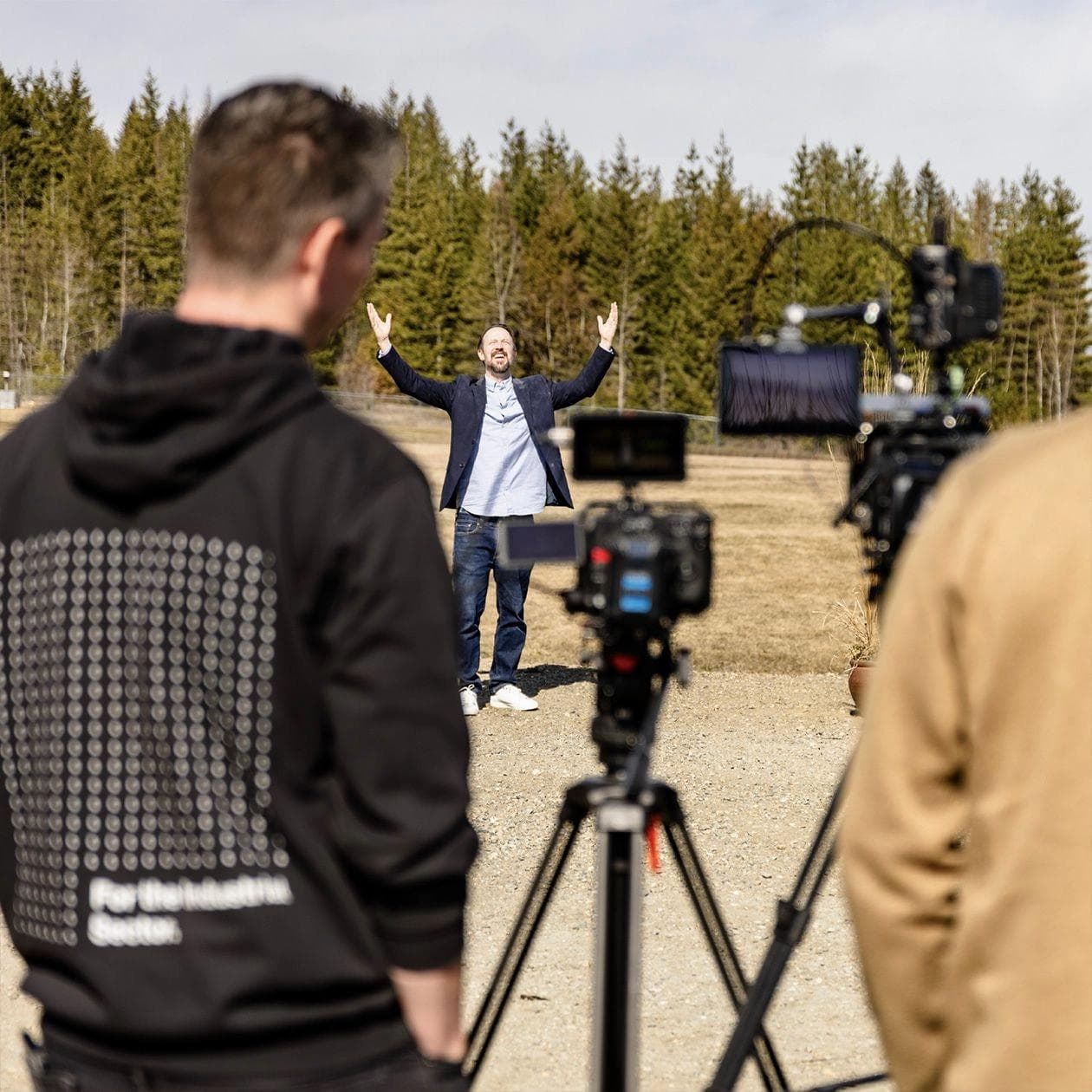 Camera crew films actor.