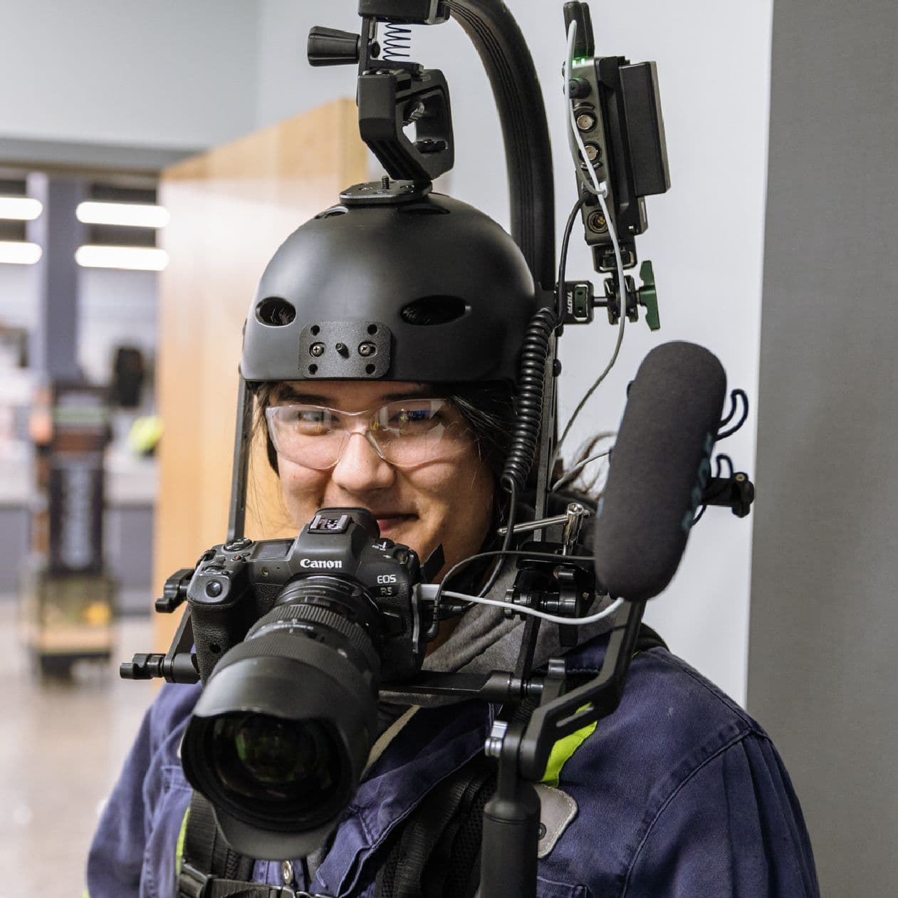 An Inland employee wearing a specialized camera attached to an helmet